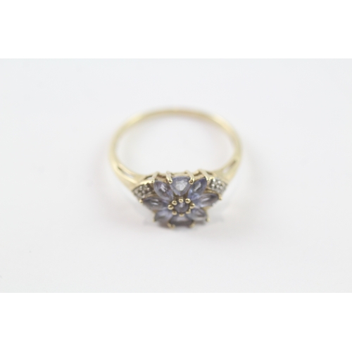 95 - 9ct gold tanzanite & diamond floral dress ring (2g) Size P