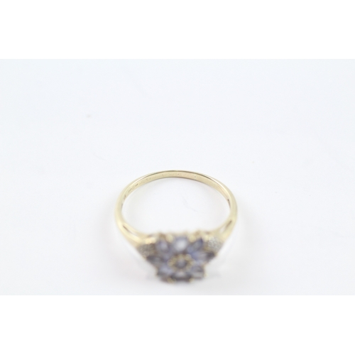 95 - 9ct gold tanzanite & diamond floral dress ring (2g) Size P