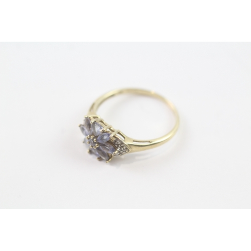 95 - 9ct gold tanzanite & diamond floral dress ring (2g) Size P