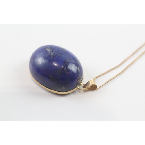 96 - 18ct gold lapis pendant W/ 9ct gold chain (10.1g)