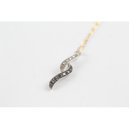 109 - 9ct gold diamond double twist pendant on chain (1g)