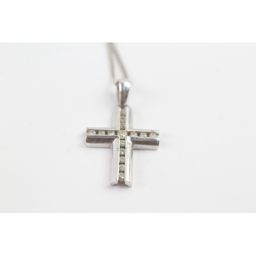 117 - 9ct white gold diamond cross pendant on chain (1.9g)