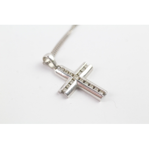 117 - 9ct white gold diamond cross pendant on chain (1.9g)