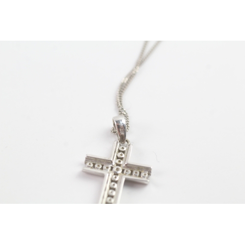 117 - 9ct white gold diamond cross pendant on chain (1.9g)