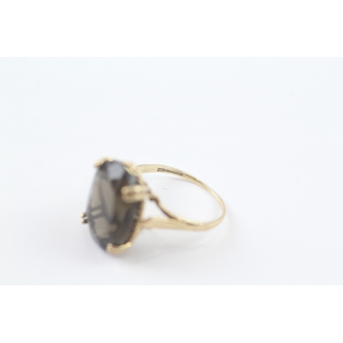 119 - 9ct gold smoky quartz cocktail ring (3.1g) Size K 1/2