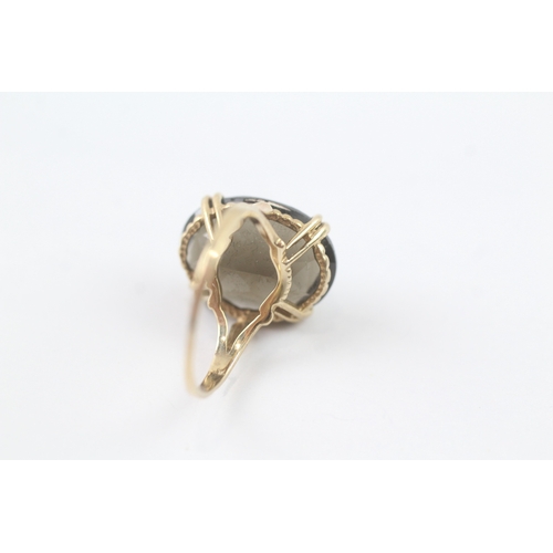 119 - 9ct gold smoky quartz cocktail ring (3.1g) Size K 1/2