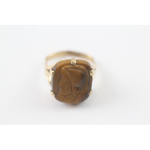 120 - 9ct gold carved tiger-eye cameo ring as found (4.8g) - as seen - misshapen Size M