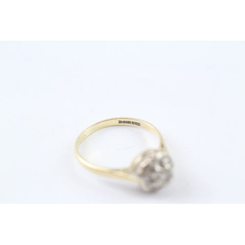 127 - 18ct gold diamond cluster ring (2.9g) Size N