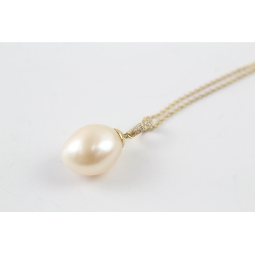 14 - 18ct gold cultured pearl and diamond drop pendant on chain (5.2g)