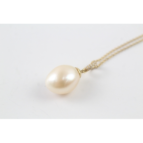 14 - 18ct gold cultured pearl and diamond drop pendant on chain (5.2g)