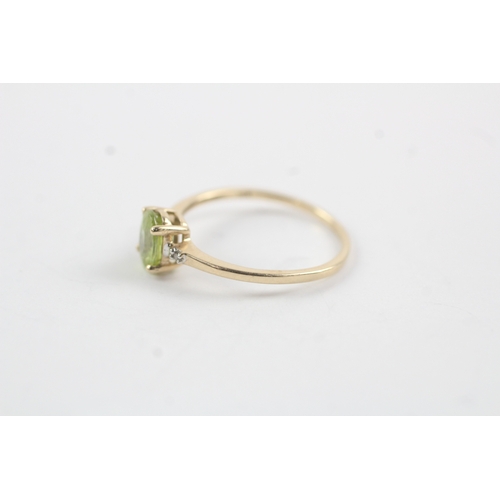 140 - 10ct gold diamond & peridot dress ring (1.3g) Size N 1/2