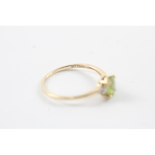 140 - 10ct gold diamond & peridot dress ring (1.3g) Size N 1/2