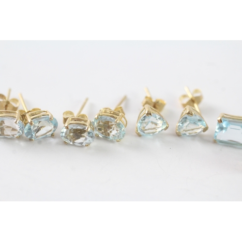 143 - 4x 9ct gold blue topaz stud & drop earrings (3.5g)