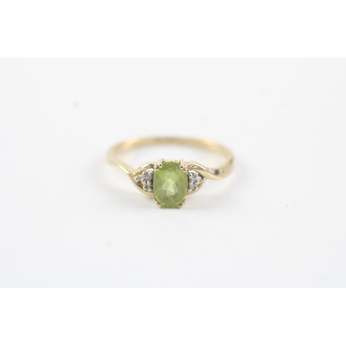 145 - 9ct gold diamond & peridot cluster ring (1.9g) Size O