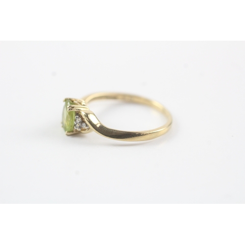 145 - 9ct gold diamond & peridot cluster ring (1.9g) Size O