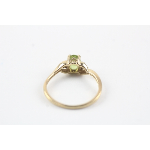 145 - 9ct gold diamond & peridot cluster ring (1.9g) Size O