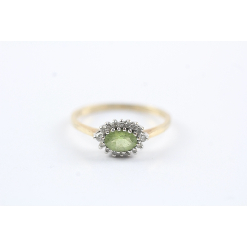 152 - 9ct gold peridot & diamond cluster ring (1.9g) Size P