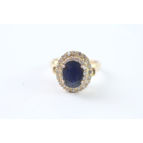 163 - 14ct gold oval cut sapphire & diamond dress ring (5.1g) Size O