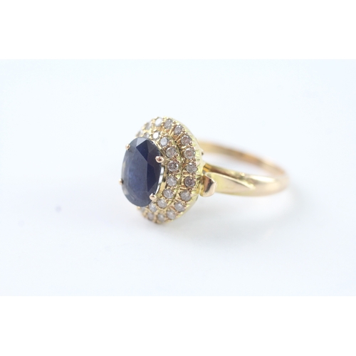 163 - 14ct gold oval cut sapphire & diamond dress ring (5.1g) Size O