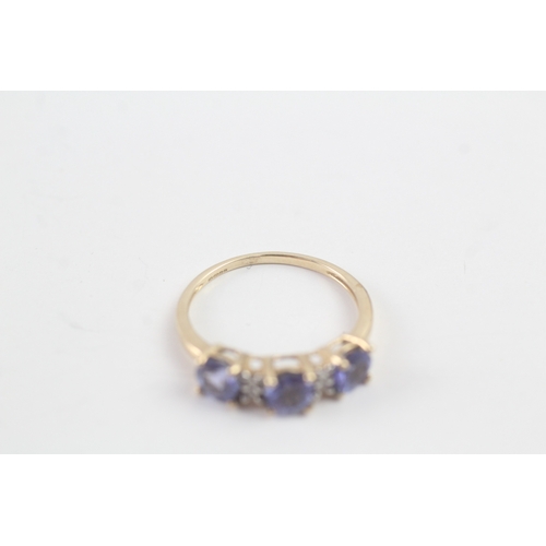 168 - 9ct gold tanzanite & diamond dress ring (2.2g) Size Q