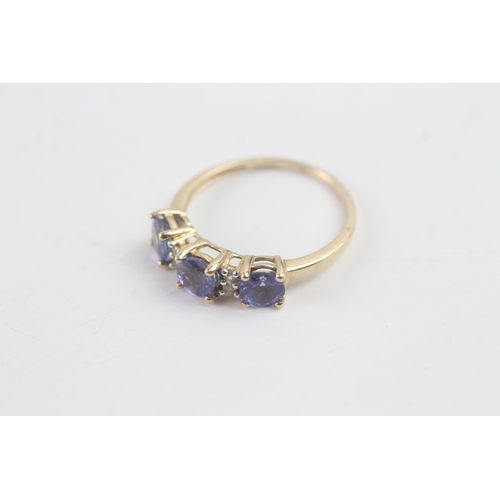 168 - 9ct gold tanzanite & diamond dress ring (2.2g) Size Q