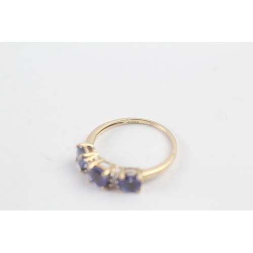 168 - 9ct gold tanzanite & diamond dress ring (2.2g) Size Q