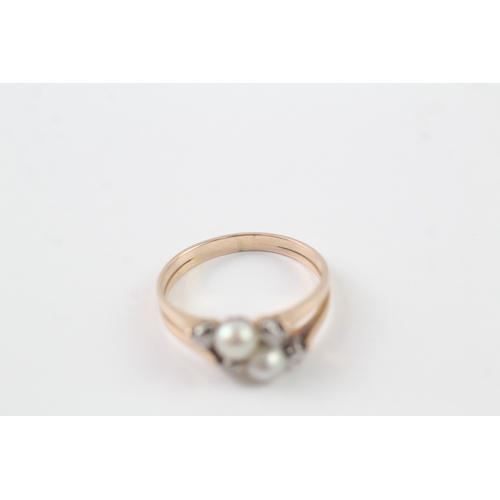 173 - 18ct gold pearl and diamond twin ring (3g) Size O