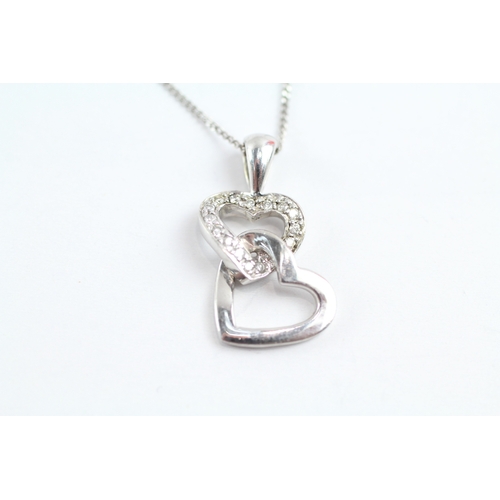 176 - 9ct gold diamond heart shape drop pendant necklace (1.7g)