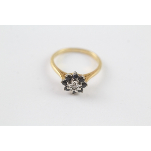 177 - 18ct gold diamond and sapphire halo ring (3.5g) Size N