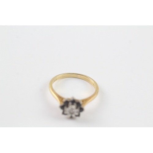 177 - 18ct gold diamond and sapphire halo ring (3.5g) Size N