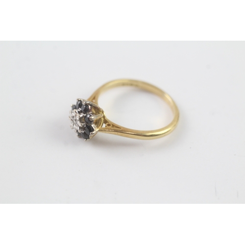 177 - 18ct gold diamond and sapphire halo ring (3.5g) Size N