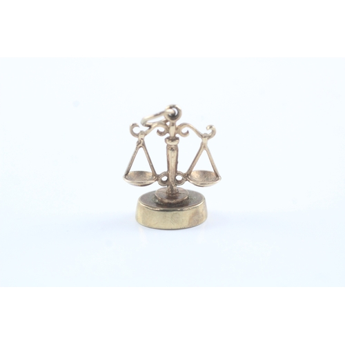 178 - 9ct gold scales of justice charm (2.1g)