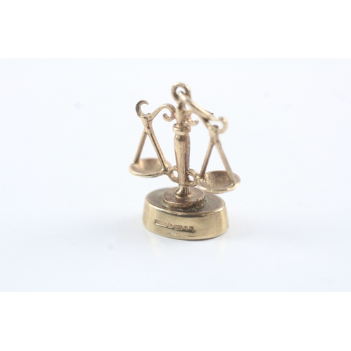 178 - 9ct gold scales of justice charm (2.1g)