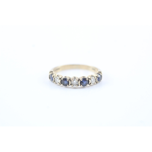 186 - 9ct gold diamond & sapphire seven stone dress band (2g) Size N