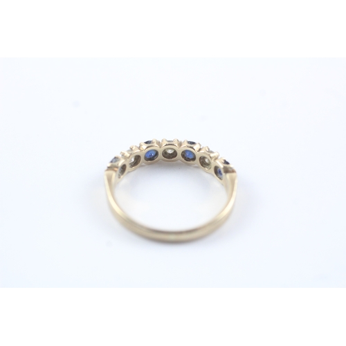 186 - 9ct gold diamond & sapphire seven stone dress band (2g) Size N