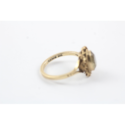 192 - 9ct gold citrine single stone cocktail ring (2.8g)