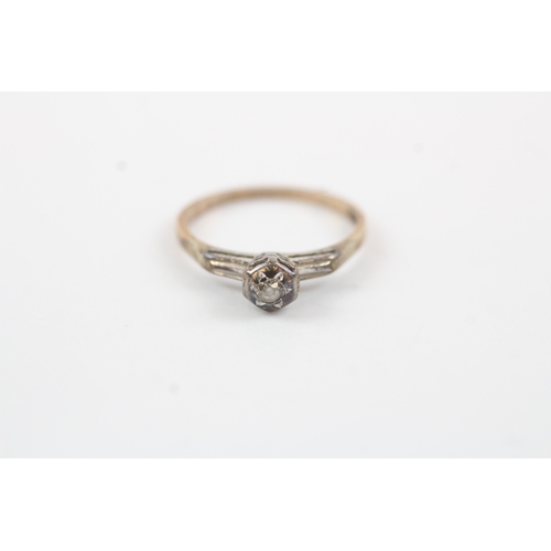 194 - 9ct gold diamond solitaire dress ring (1.8g) Size N