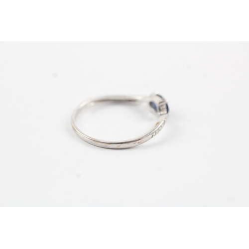 195 - 9ct white gold diamond & sapphire bypass ring (1.2g) Size P