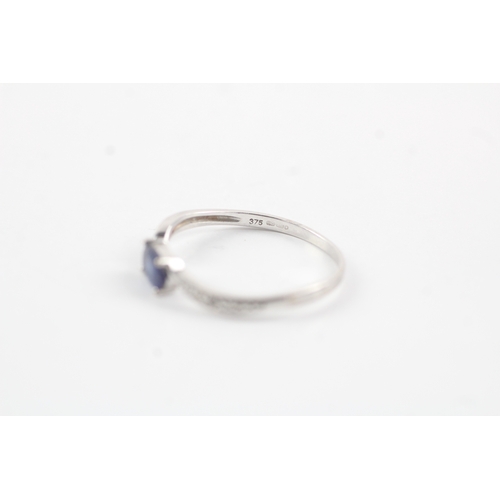 195 - 9ct white gold diamond & sapphire bypass ring (1.2g) Size P