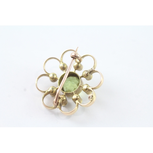 203 - 15ct gold Edwardian peridot & seed pearl brooch (3g)