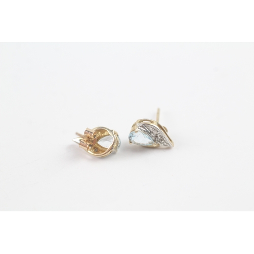 209 - 9ct gold diamond and blue gemstone twist earrings (1.3g)