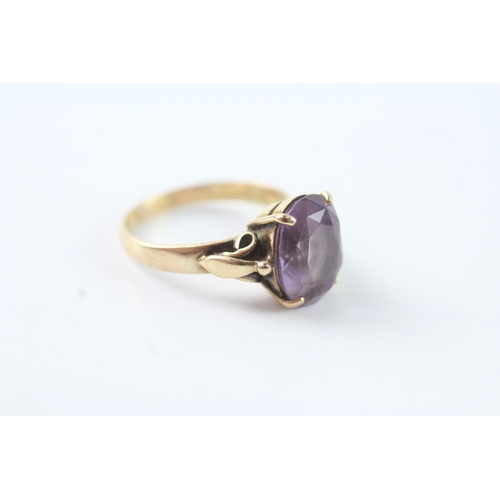 213 - 14ct gold oval cut amethyst dress ring (3.5g) Size M