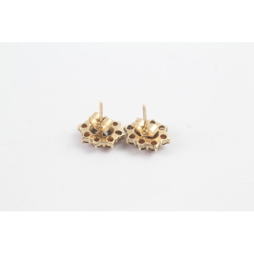 216 - 9ct gold garnet halo stud earrings (1.8g)