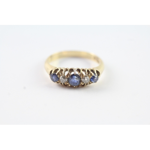 219 - 18ct gold diamond & sapphire cluster dress ring (4.5g) Size M