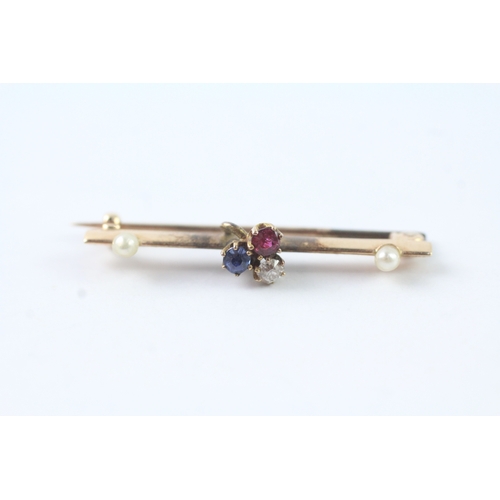 22 - 14ct gold sapphire, ruby, diamond and pearl brooch (2.1g)