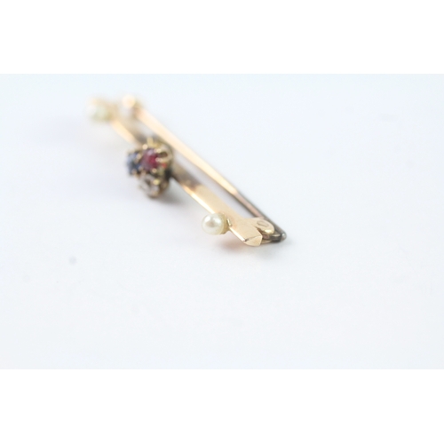 22 - 14ct gold sapphire, ruby, diamond and pearl brooch (2.1g)