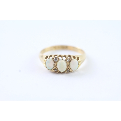 227 - 18ct gold vintage gypsy set opal and diamond dress ring (2.4g) Size L 1/2