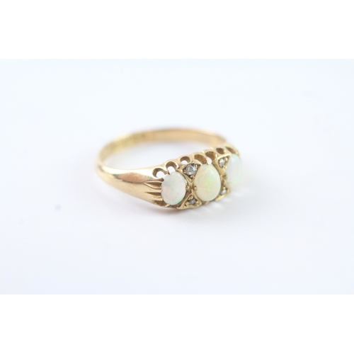 227 - 18ct gold vintage gypsy set opal and diamond dress ring (2.4g) Size L 1/2