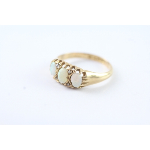 227 - 18ct gold vintage gypsy set opal and diamond dress ring (2.4g) Size L 1/2