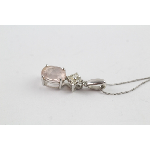 234 - 9ct white gold diamond and pink gemstone pendant on chain (1.7g)